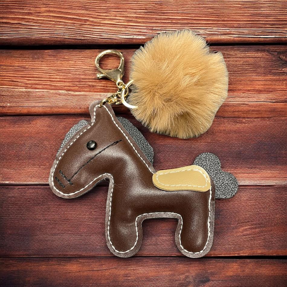 PU Leather look horse keyring with pom pom