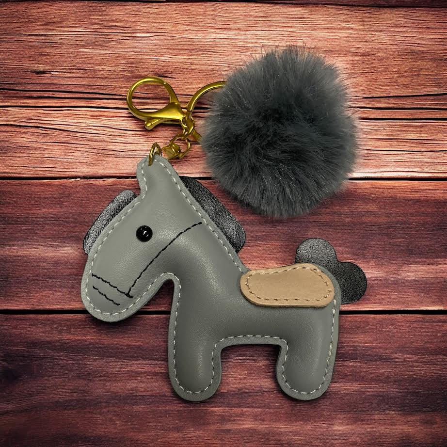 PU Leather look horse keyring with pom pom