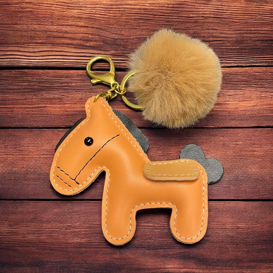 PU Leather look horse keyring with pom pom
